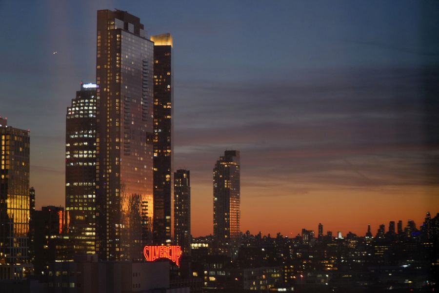 Tall towers silhouetted against a dusk sky